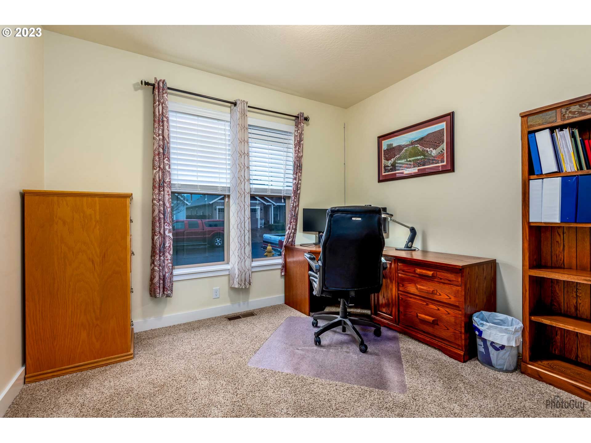 975 Riverstone Lane Springfield, OR 97477 - Photo 20 of 27 a view of a workspace with furniture and a window