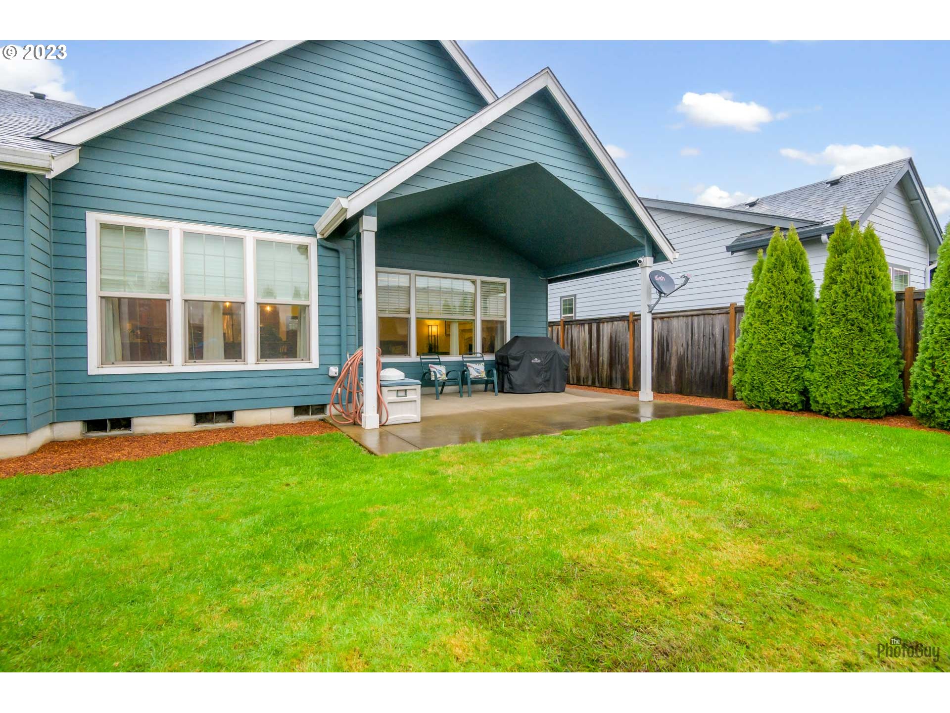 975 Riverstone Lane Springfield, OR 97477 - Photo 26 of 27 a front view of house with yard and outdoor seating