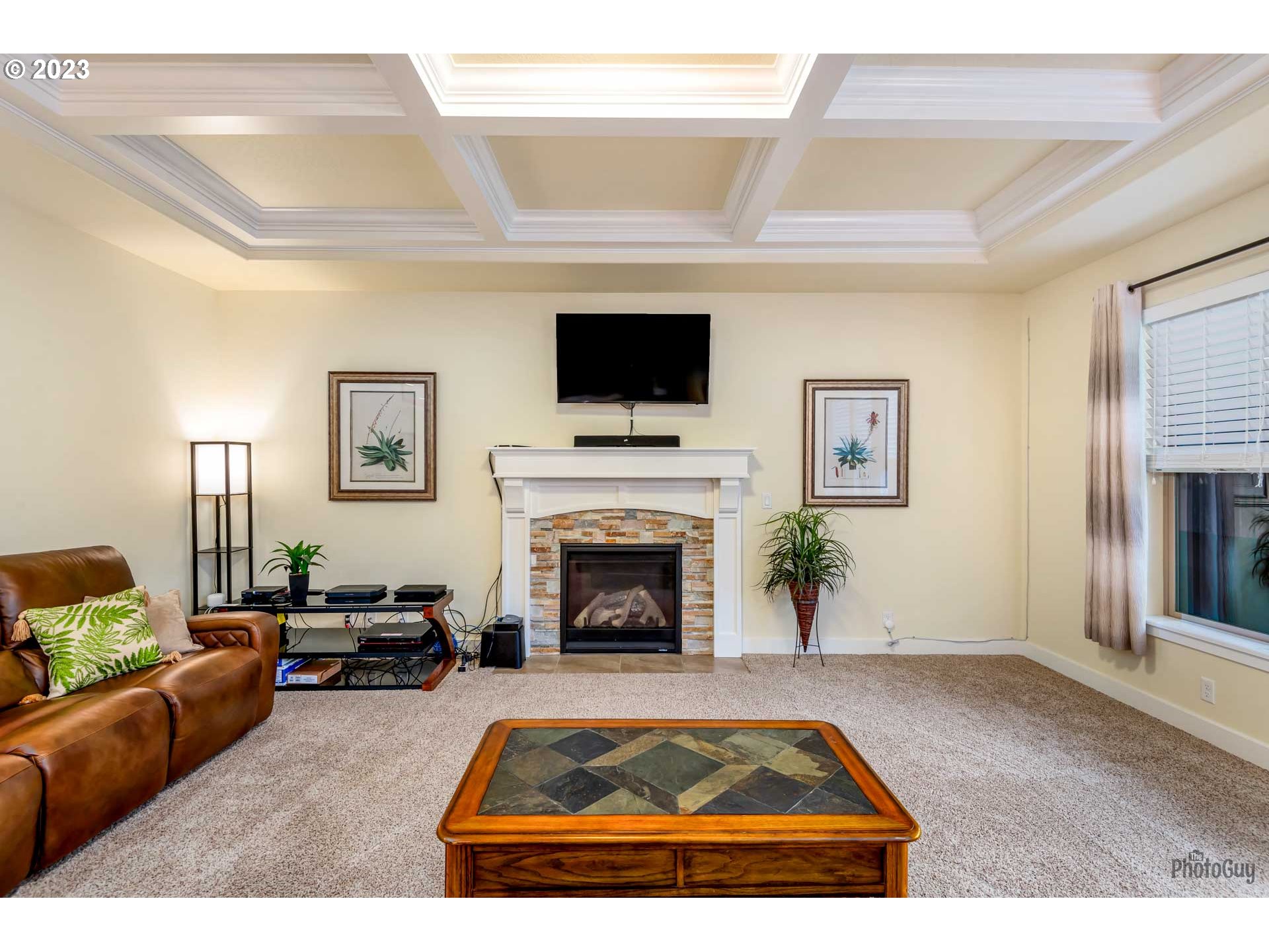 975 Riverstone Lane Springfield, OR 97477 - Photo 4 of 27 a living room with furniture and a fireplace