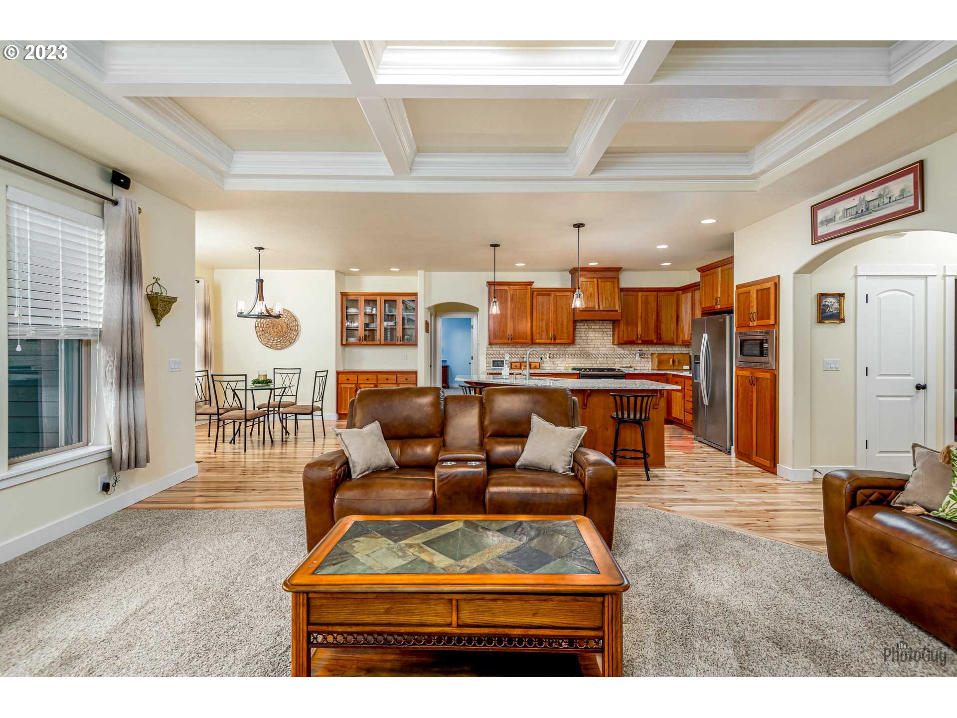 975 Riverstone Lane Springfield, OR 97477 - Photo 7 of 27 a living room with furniture and a table