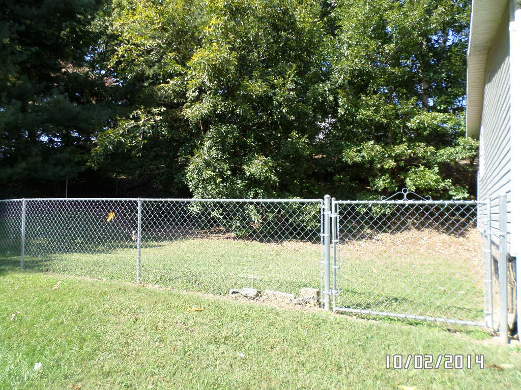405 Barker Road New Tazewell, TN 37825 - Photo 4 of 22 back yard