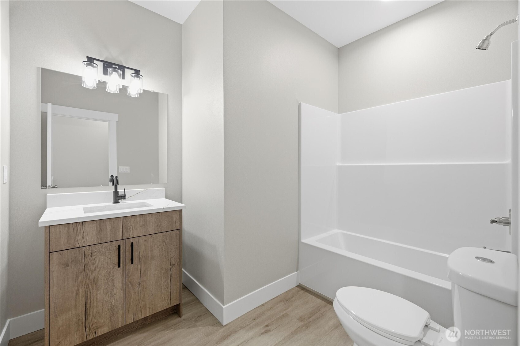 6473 Watson Loop Maple Falls, WA 98266 - Photo 16 of 25 a bathroom with a sink a toilet and shower