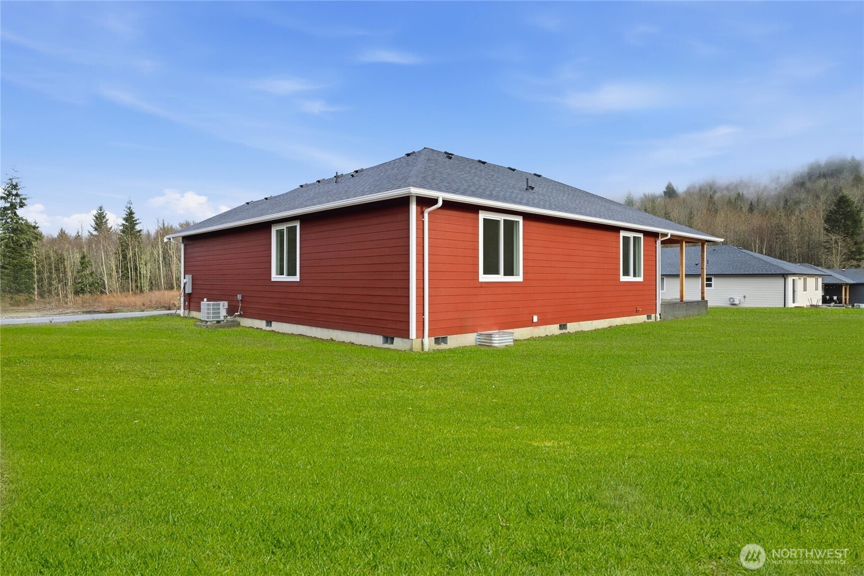 6473 Watson Loop Maple Falls, WA 98266 - Photo 22 of 25 a front view of house with yard and green space