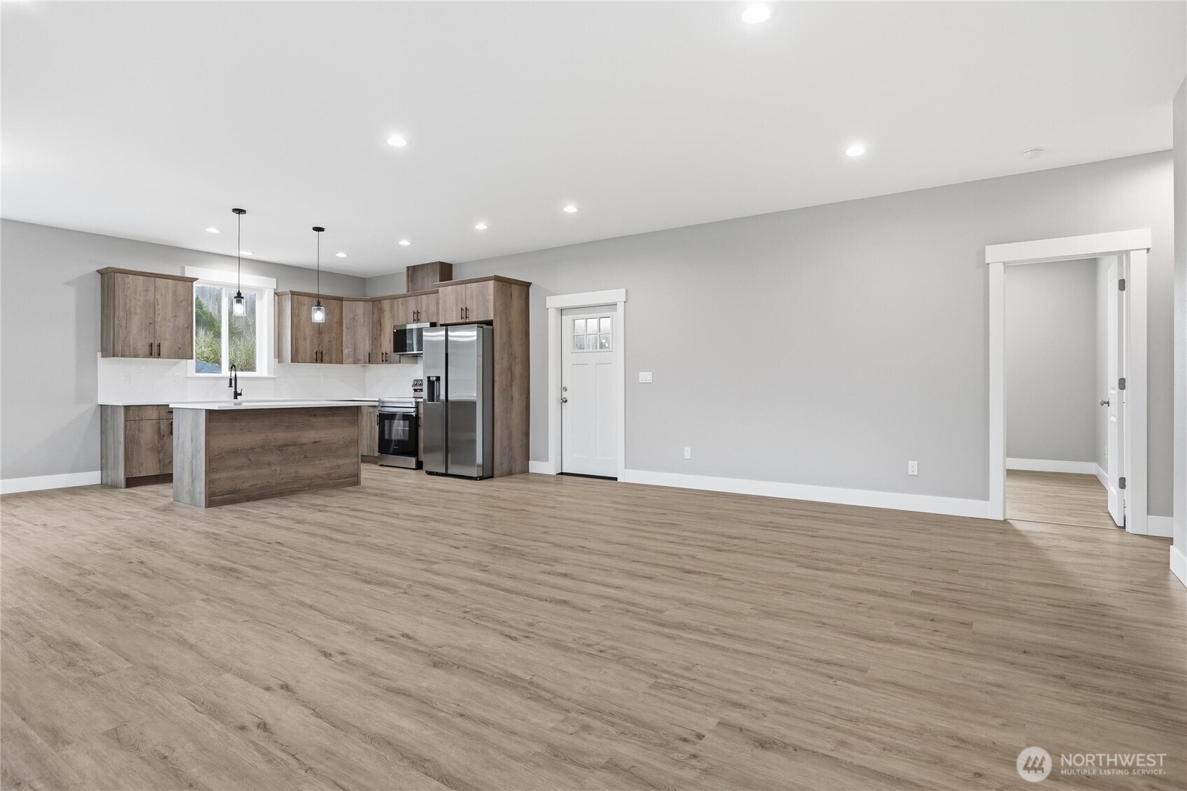 6473 Watson Loop Maple Falls, WA 98266 - Photo 4 of 25 a view of a kitchen with a sink cabinets and wooden floor