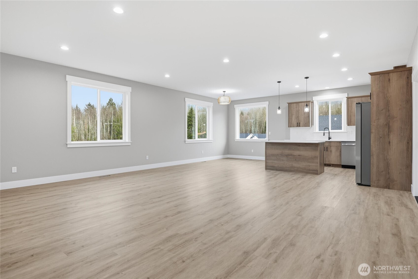 6473 Watson Loop Maple Falls, WA 98266 - Photo 5 of 25 a view of empty room with wooden floor and window