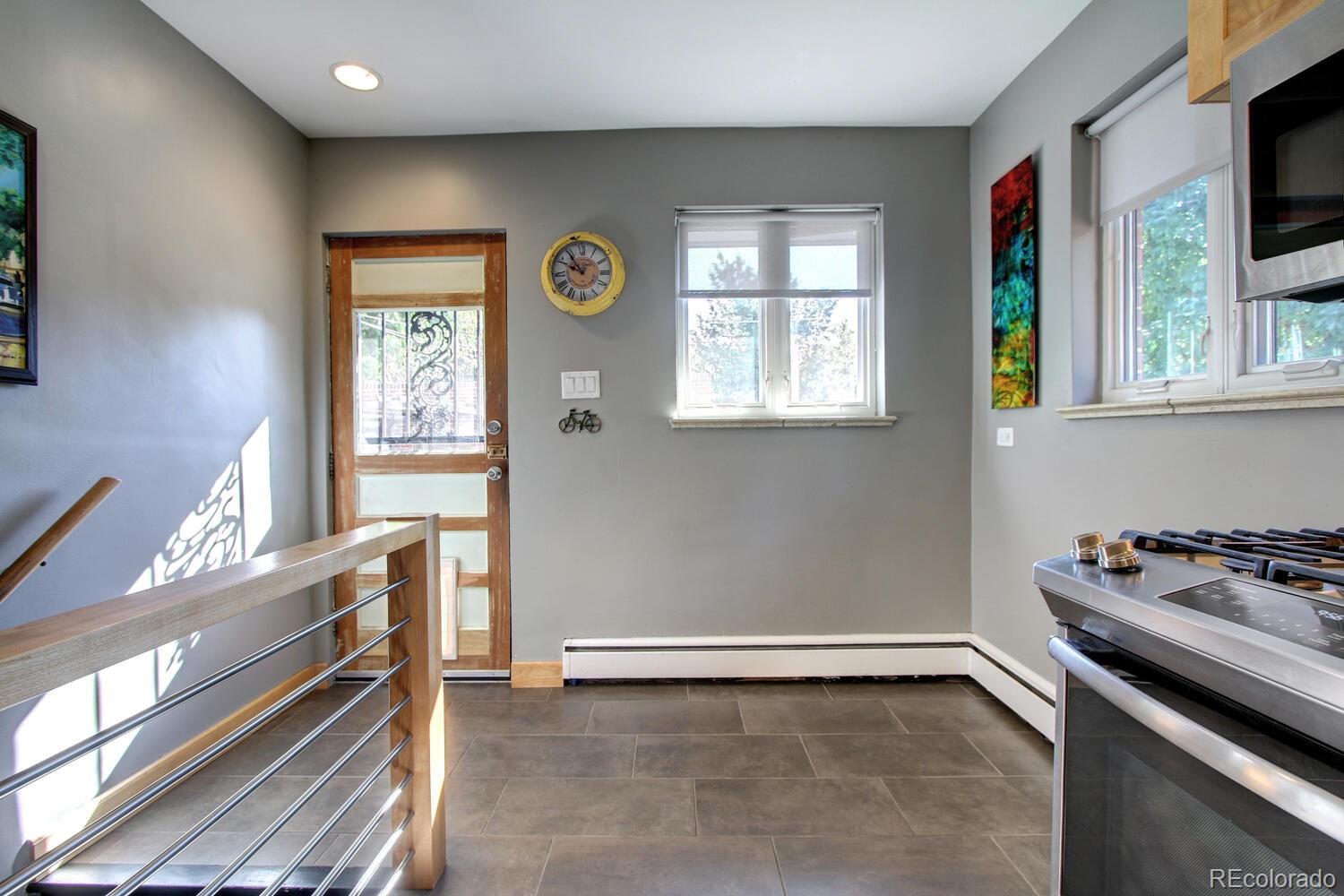1300 Elm Street Denver, CO 80220 - Photo 16 of 40 a view of a kitchen with an oven