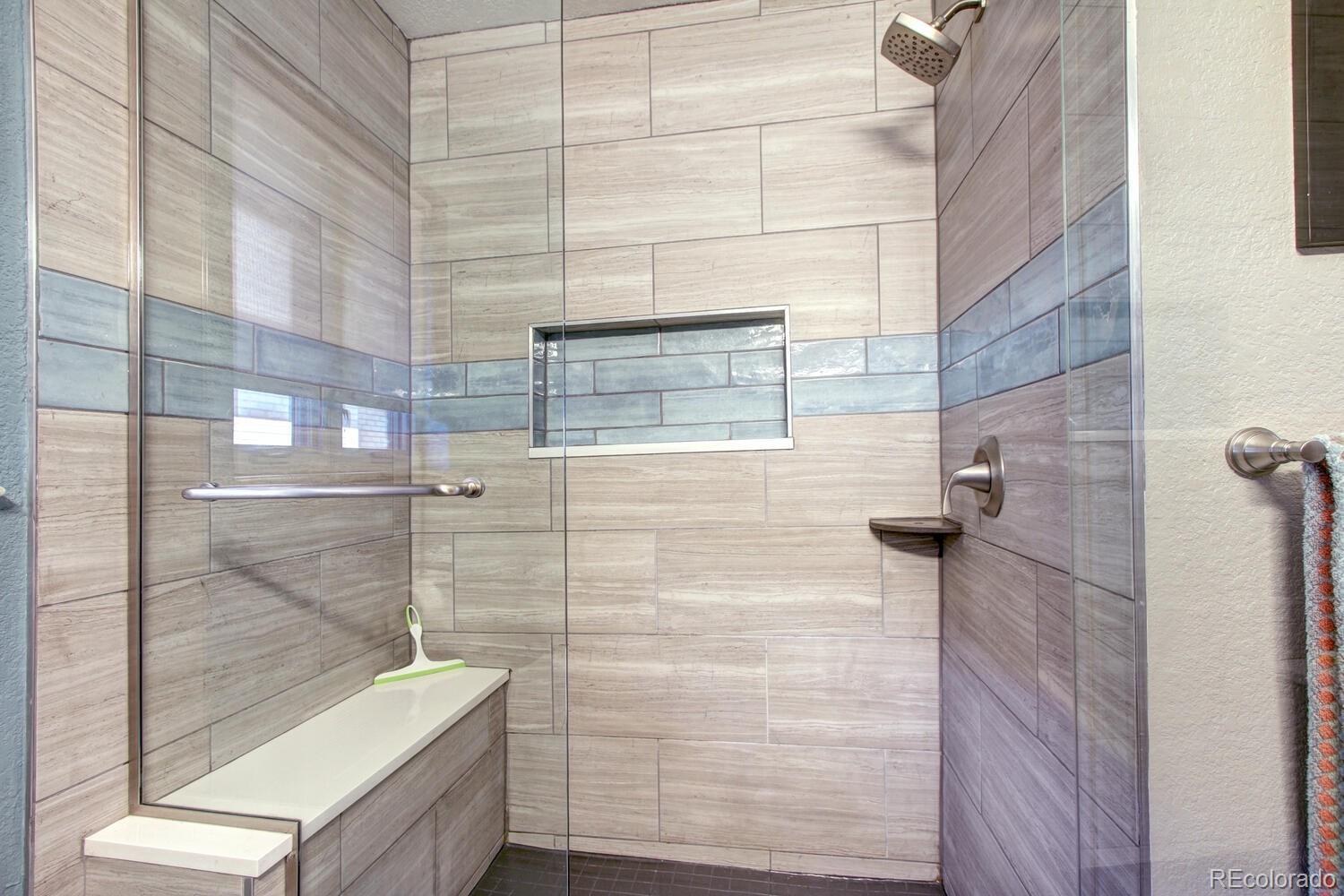 1300 Elm Street Denver, CO 80220 - Photo 20 of 40 a bathroom with a shower