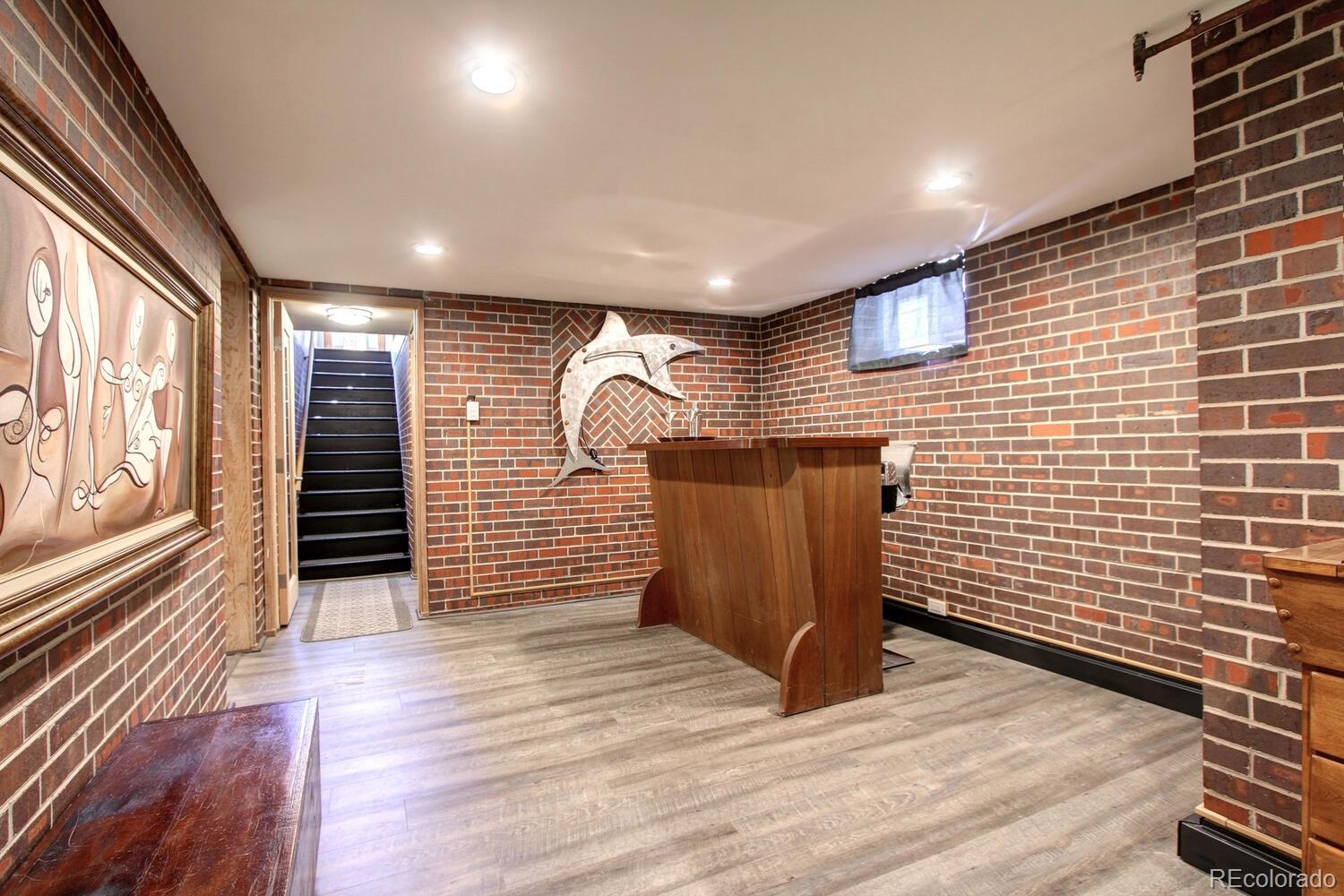 1300 Elm Street Denver, CO 80220 - Photo 23 of 40 a view of wooden door of the house
