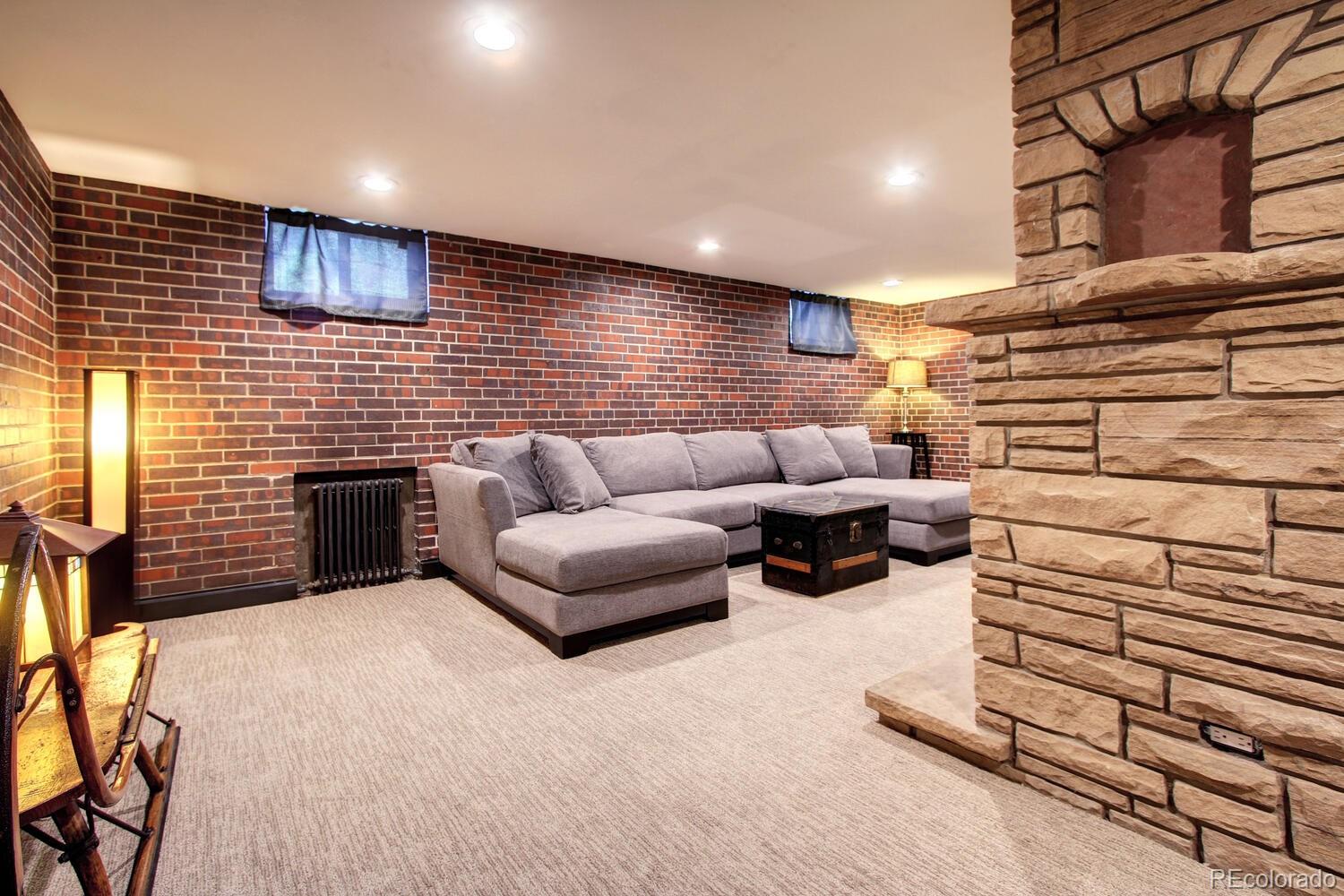1300 Elm Street Denver, CO 80220 - Photo 24 of 40 a view of a patio with couches and potted plants