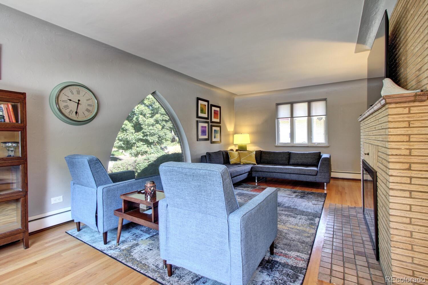 1300 Elm Street Denver, CO 80220 - Photo 4 of 40 a living room with furniture and a window