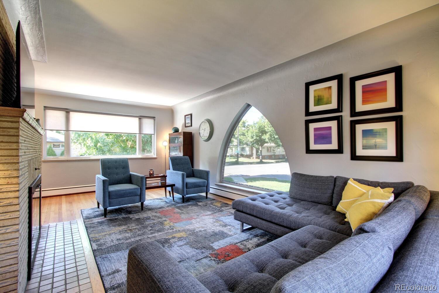 1300 Elm Street Denver, CO 80220 - Photo 5 of 40 a living room with furniture and a window