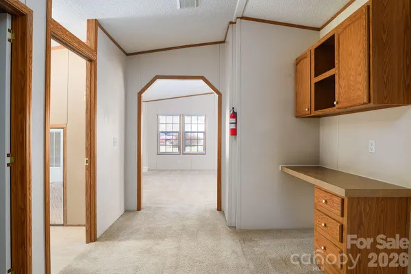 a view of livingroom with washer and dryer