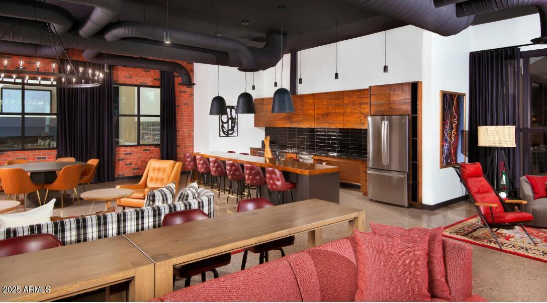 3700 East Williams Field Road, Unit 2 Gilbert, AZ 85295 - Photo 16 of 16 a dining room with furniture and a window