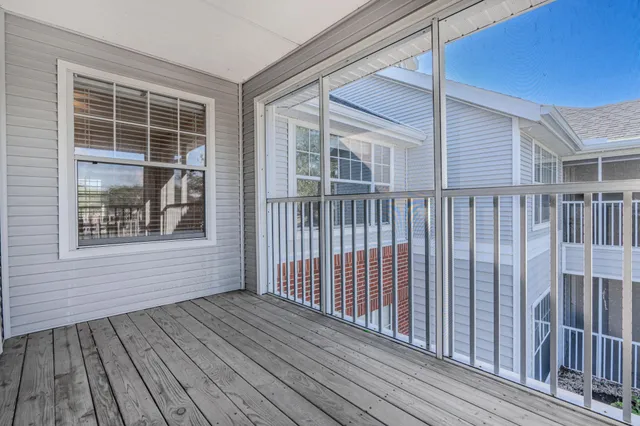 a front view of residential houses with yard