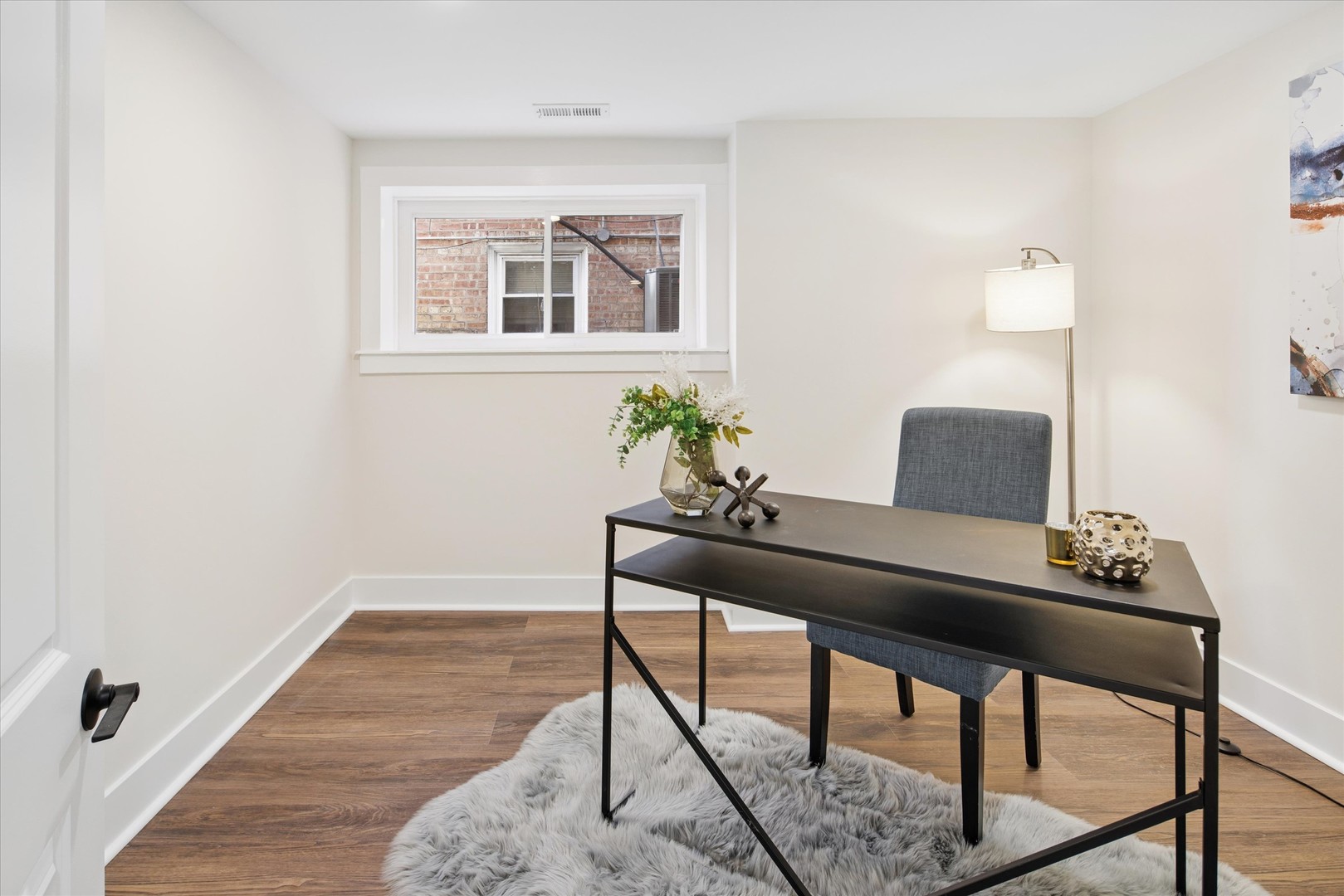 5604 North Mango Avenue Chicago, IL 60646 - Photo 18 of 20 a workspace with furniture and window