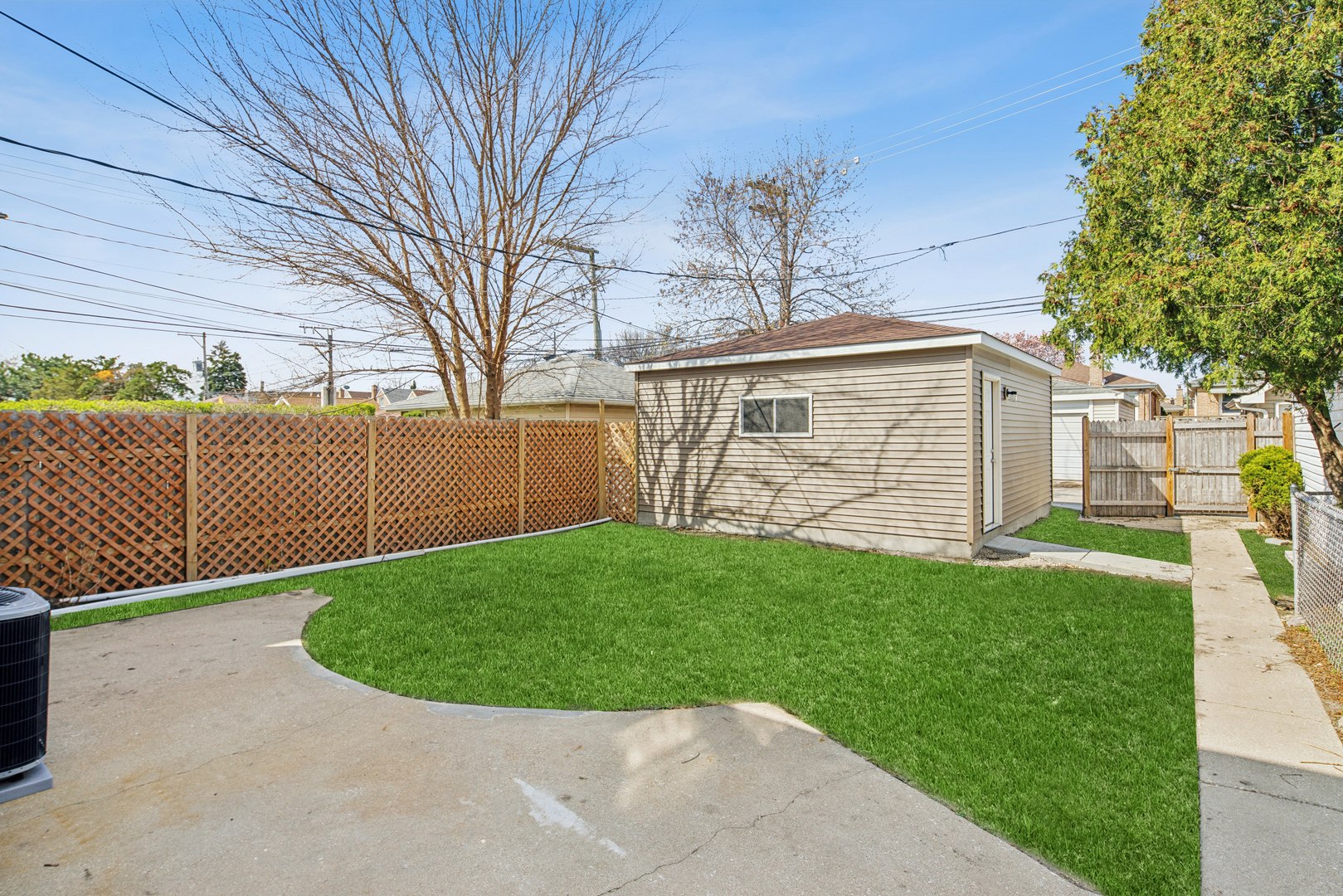 5604 North Mango Avenue Chicago, IL 60646 - Photo 20 of 20 a view of a backyard with a garden