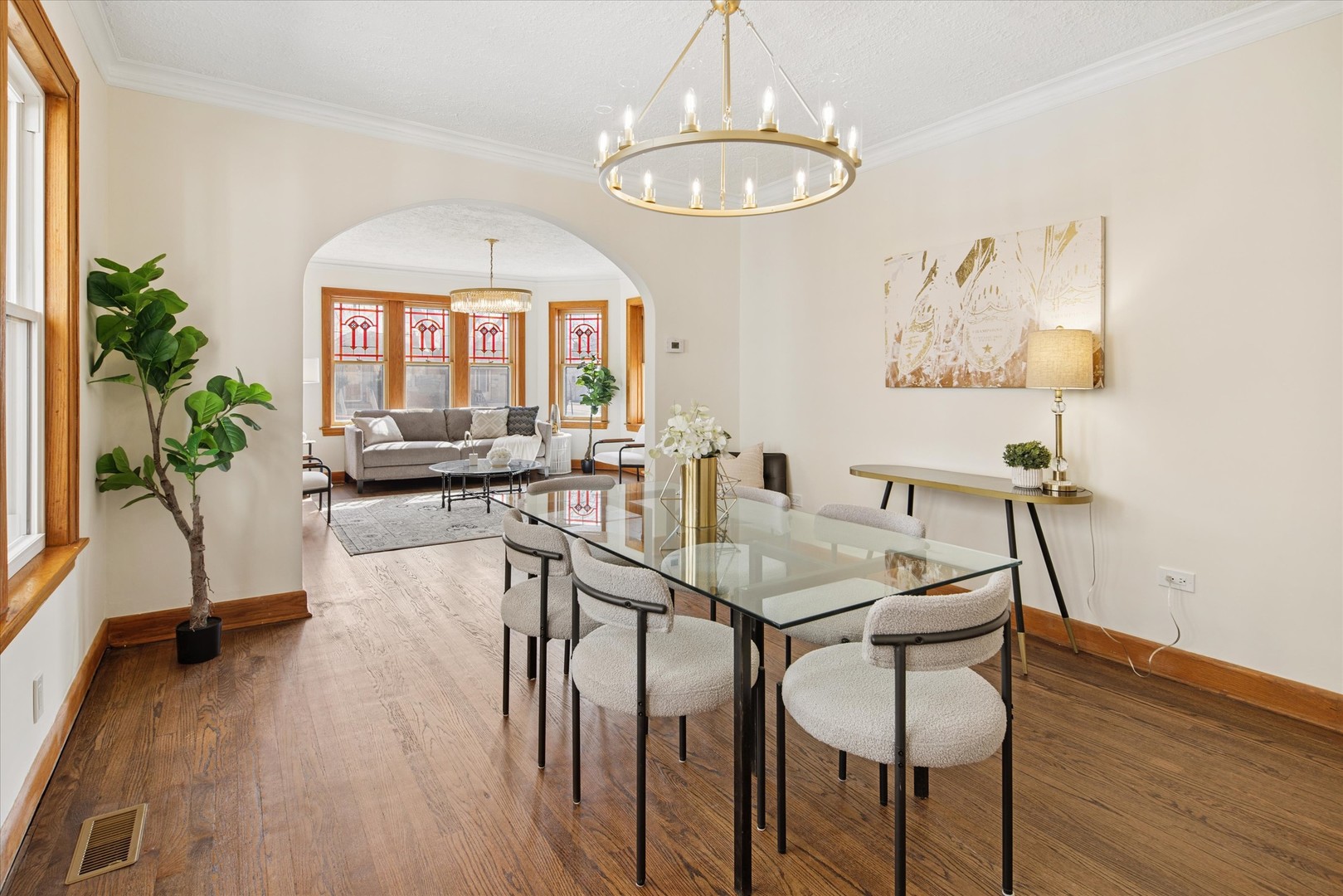 5604 North Mango Avenue Chicago, IL 60646 - Photo 5 of 20 a view of a dining room with furniture window and wooden floor