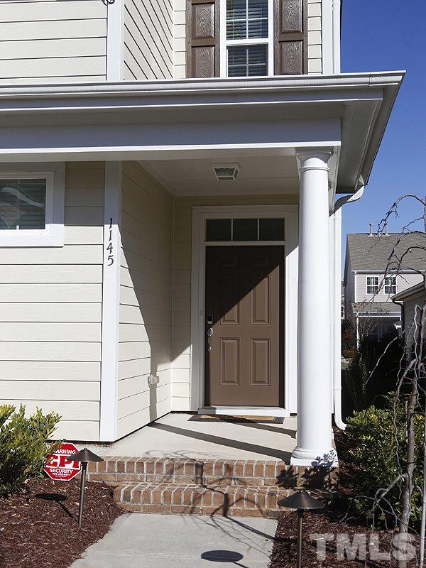 1145 Chapanoke Road Raleigh, NC 27603 - Photo 2 of 25 Not many steps to the front door and a small lot size for easy living.