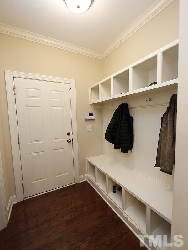 1145 Chapanoke Road Raleigh, NC 27603 - Photo 14 of 25 This drop zone is so functional with cubbies above and below the hooks.