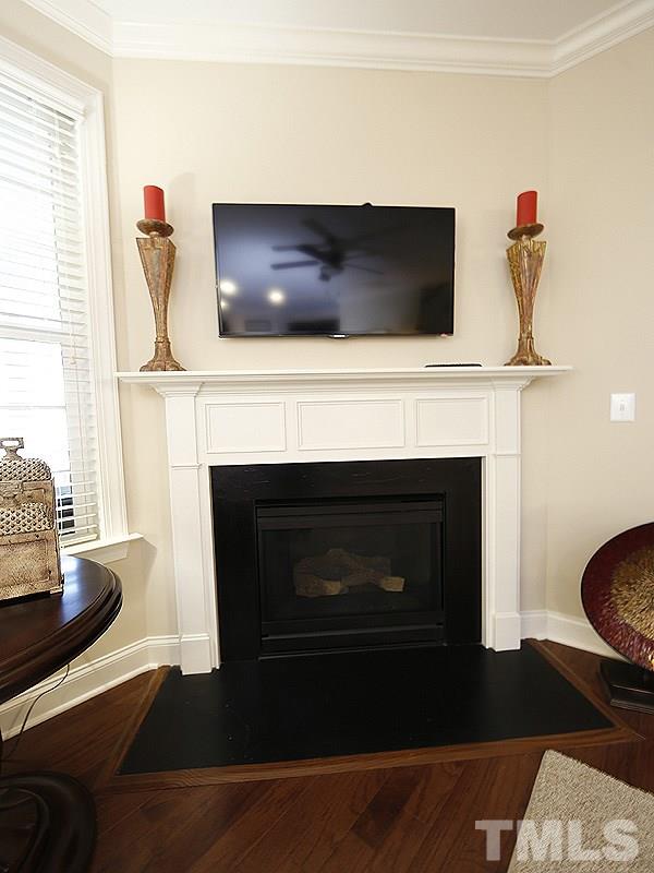 1145 Chapanoke Road Raleigh, NC 27603 - Photo 7 of 25 There is a connection for the TV above the corner fireplace.