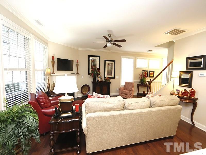 1145 Chapanoke Road Raleigh, NC 27603 - Photo 8 of 25 A view of the Living room from the kitchen/dining area. Windows provide lots of natural light.