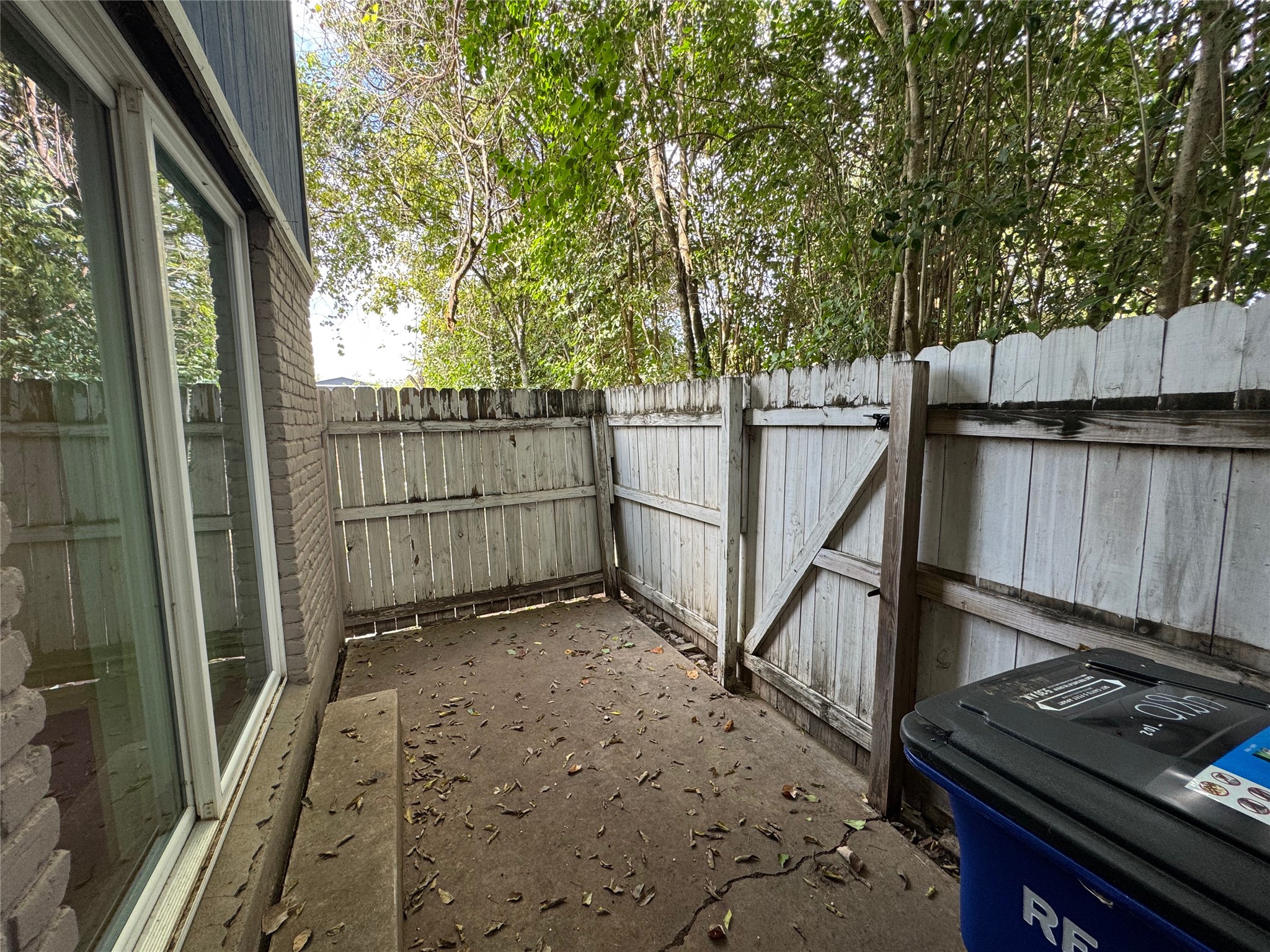 4810 West Wind Trail, Unit 102 Austin, TX 78745 - Photo 21 of 23 a view of a backyard