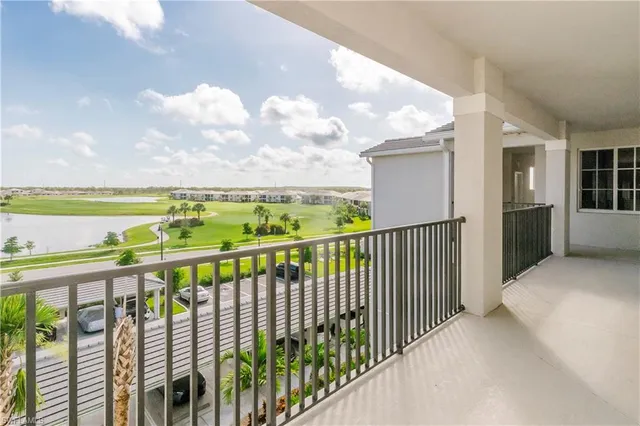 a view of a balcony with an ocean view
