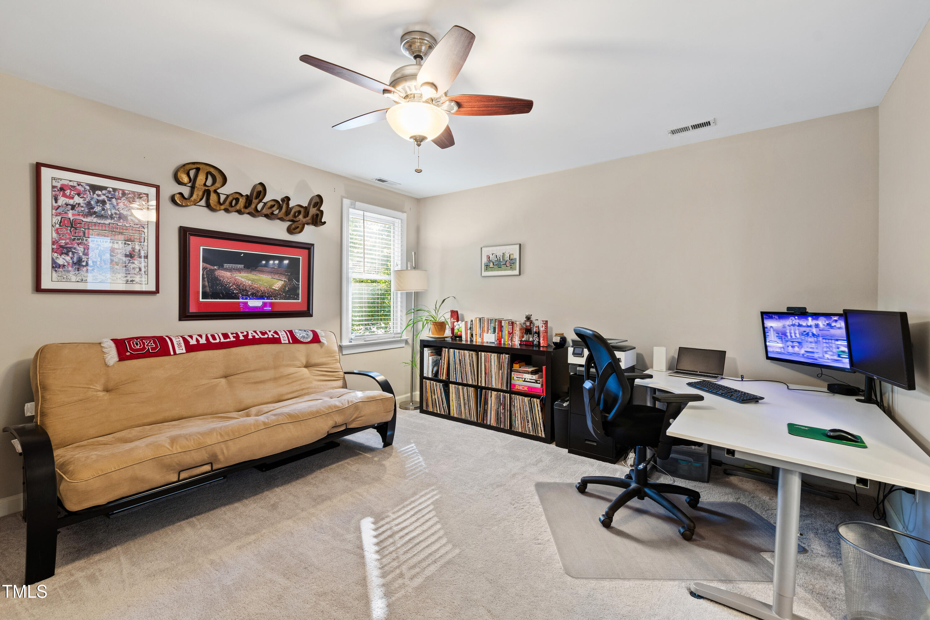 5408 Fairmead Circle Raleigh, NC 27613 - Photo 36 of 43 a bed room with a bed and a desk