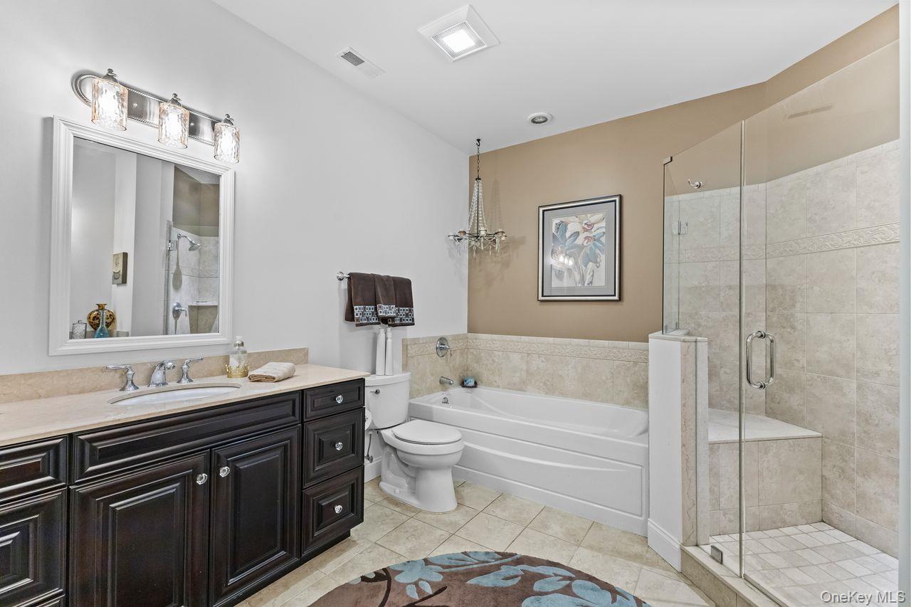 43 Yesterday Drive Cold Spring, NY 10516 - Photo 13 of 36 Primary bathroom with soaking tub and walk in shower.