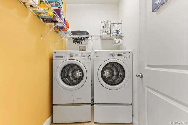 a view of a storage & utility room with a sink