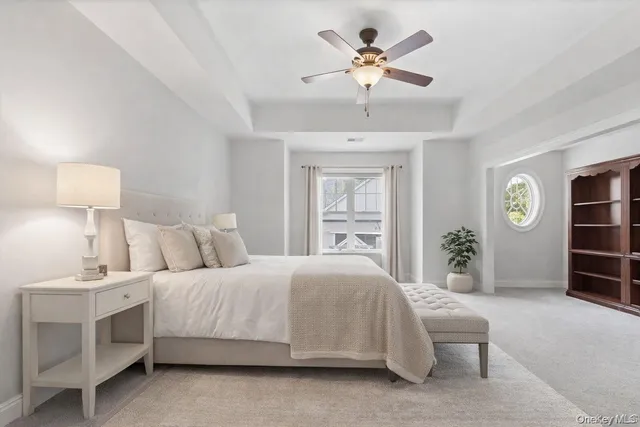 a view of a grassy field with an trees