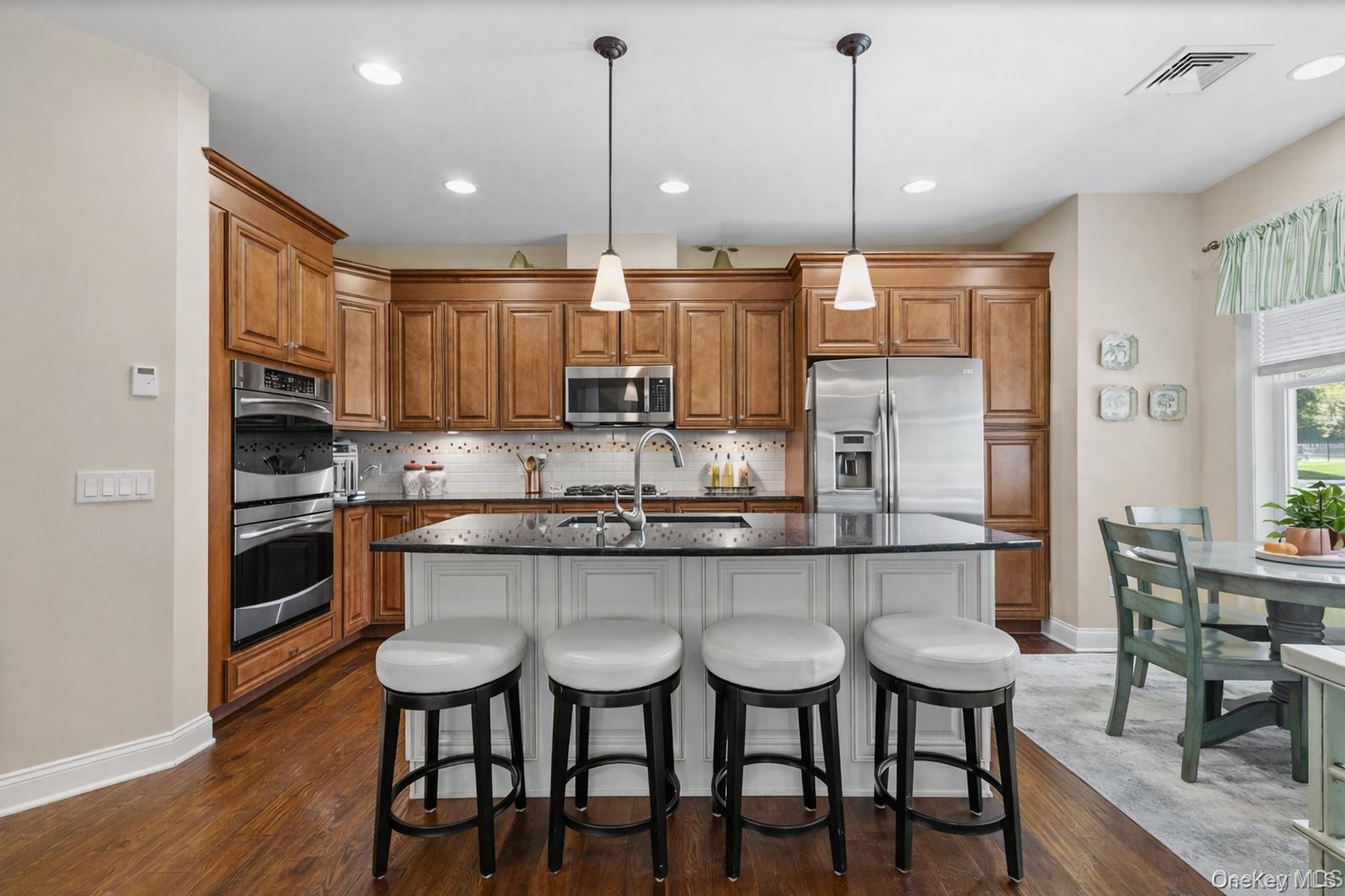 43 Yesterday Drive Cold Spring, NY 10516 - Photo 7 of 36 Kitchen features SS appliances, heated wood floors, granite countertops and center island. Virtually painted.