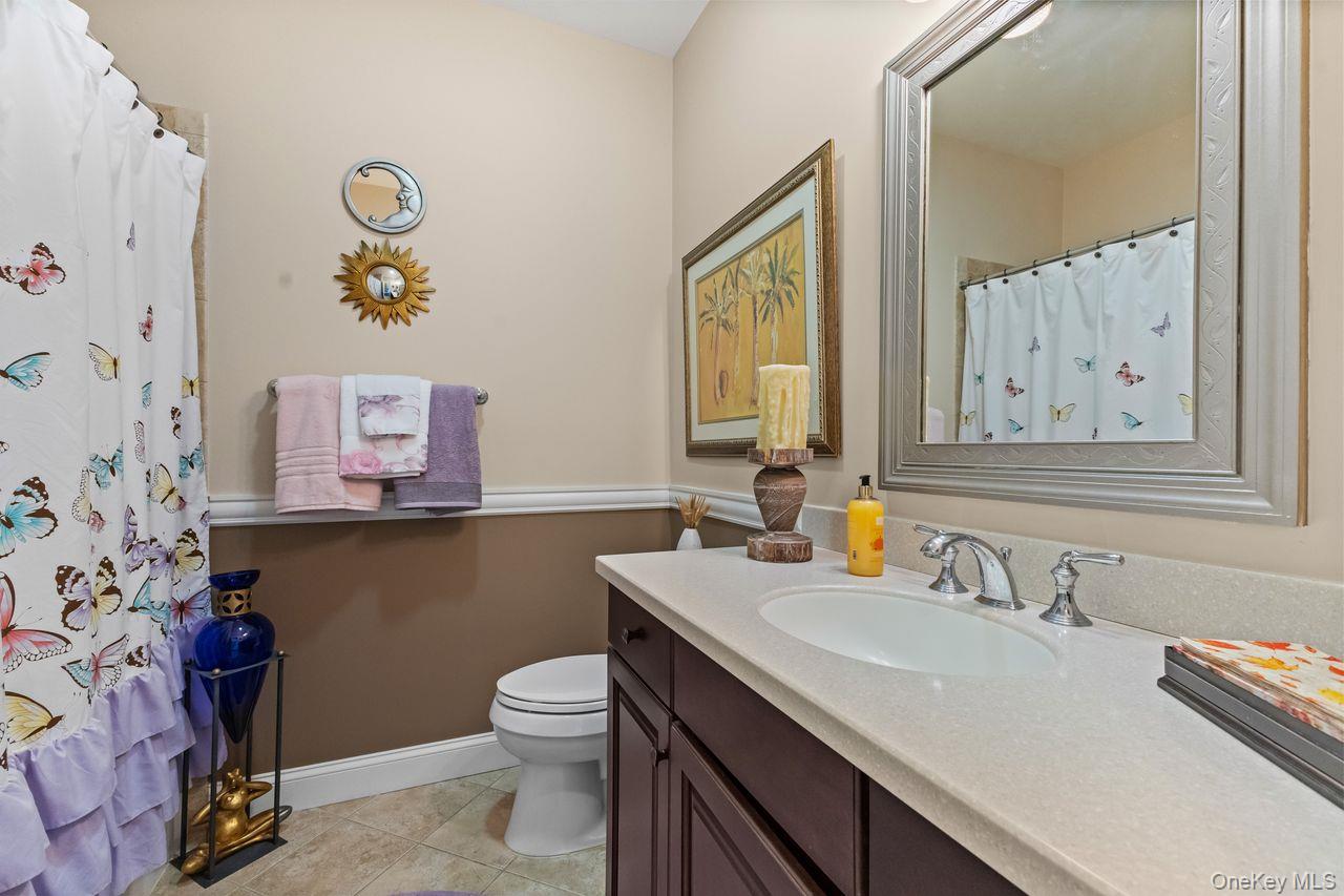 43 Yesterday Drive Cold Spring, NY 10516 - Photo 9 of 36 Main floor bathroom with tub/shower.