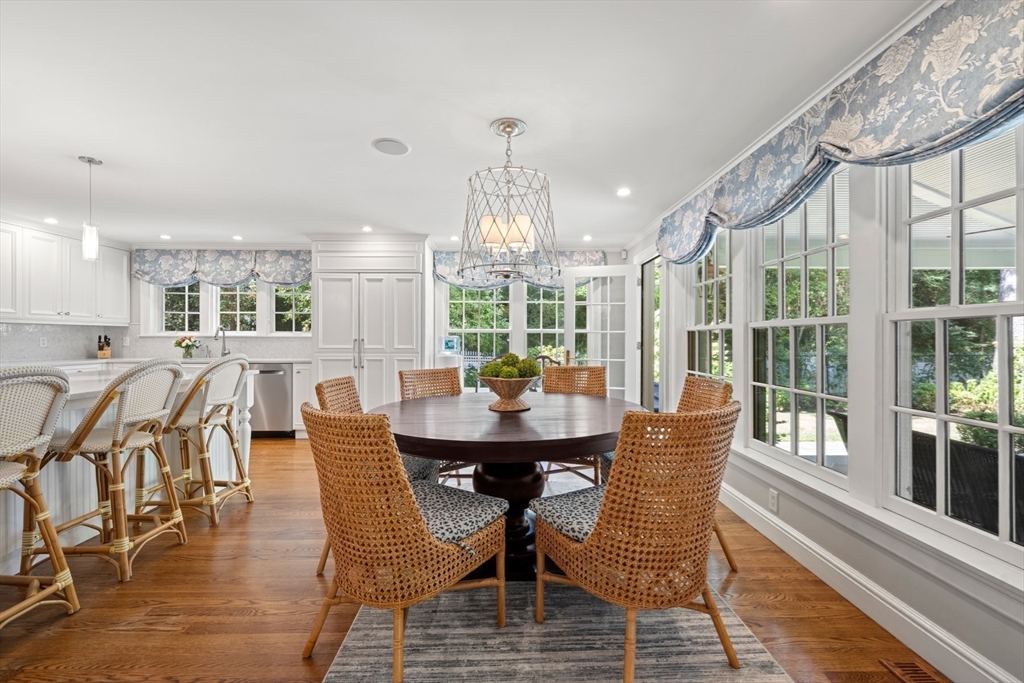193 Winding River Road Wellesley, MA 02482 - Photo 12 of 42 a view of a dining room with furniture window and wooden floor