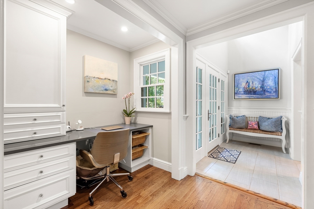 193 Winding River Road Wellesley, MA 02482 - Photo 18 of 42 a view of a workspace with furniture and a window