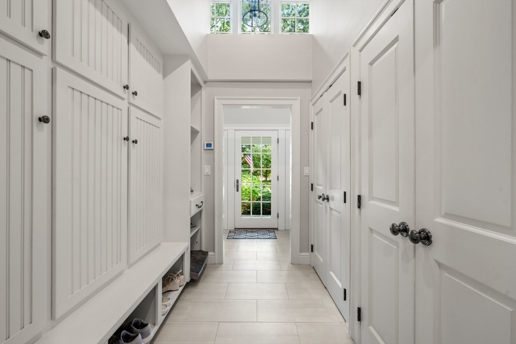 193 Winding River Road Wellesley, MA 02482 - Photo 19 of 42 a hallway with white doors