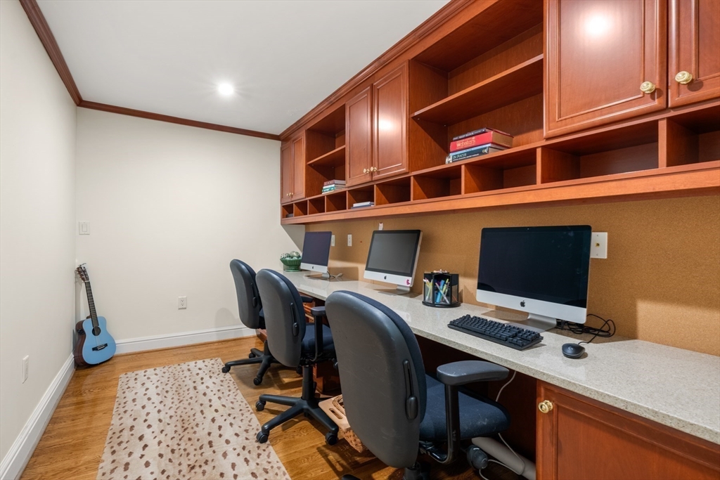193 Winding River Road Wellesley, MA 02482 - Photo 21 of 42 a view of a workspace with furniture