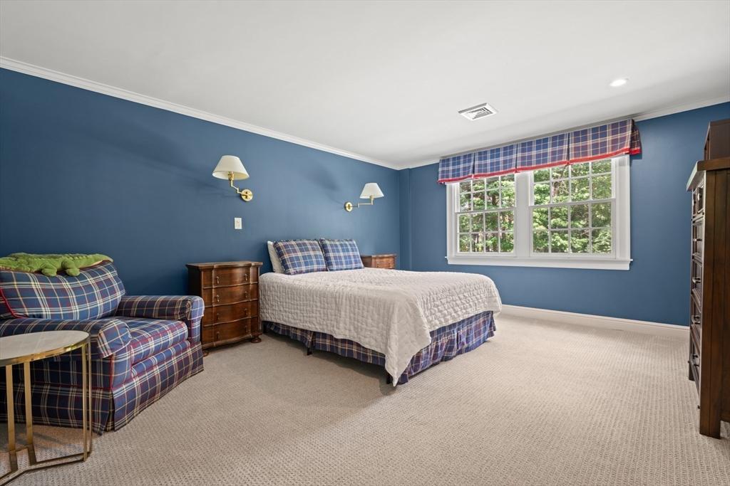 193 Winding River Road Wellesley, MA 02482 - Photo 29 of 42 a bedroom with bed and window