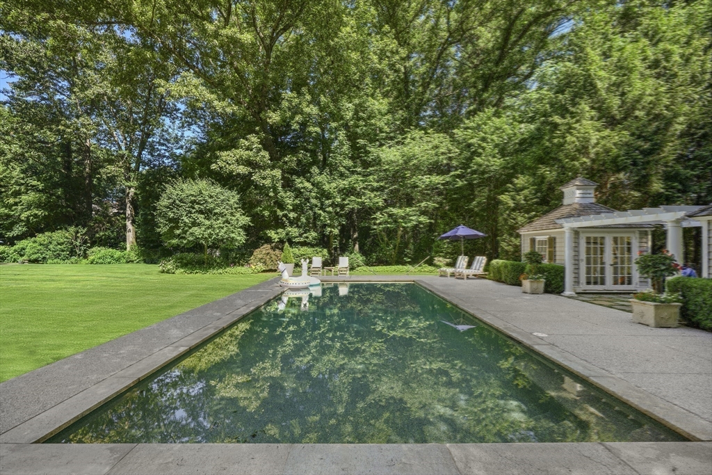 193 Winding River Road Wellesley, MA 02482 - Photo 38 of 42 a view of backyard with a garden and trees