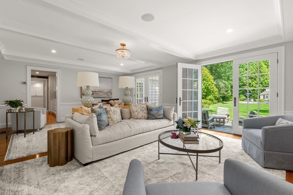 193 Winding River Road Wellesley, MA 02482 - Photo 5 of 42 a living room with furniture and a large window