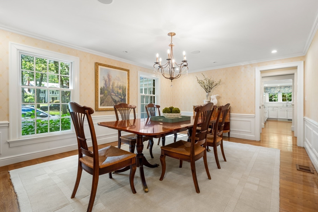 193 Winding River Road Wellesley, MA 02482 - Photo 8 of 42 a view of a dining room with furniture window and wooden floor