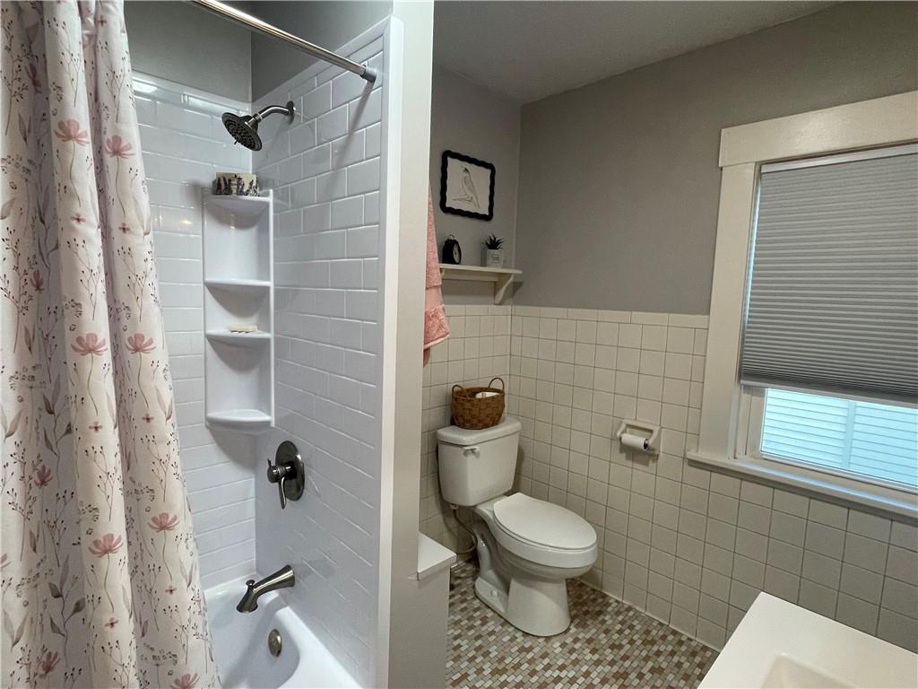 33 Line Street Sharpsville, PA 16150 - Photo 16 of 34 a bathroom with a toilet and a shower