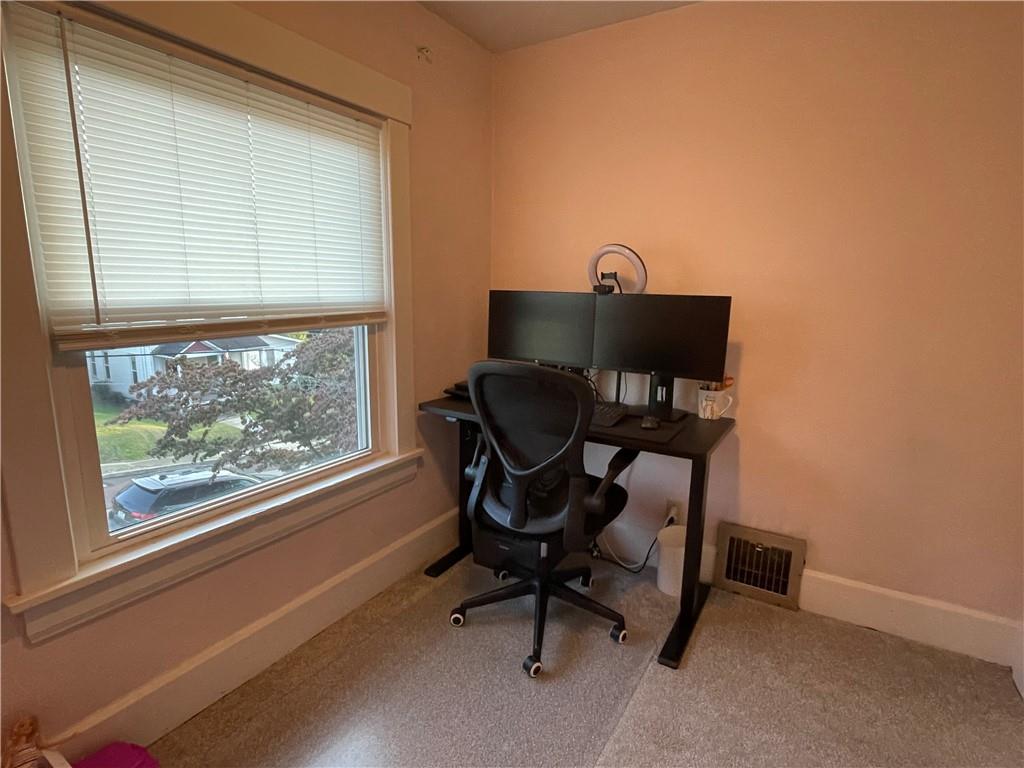 33 Line Street Sharpsville, PA 16150 - Photo 20 of 34 a view of a workspace with furniture and a window
