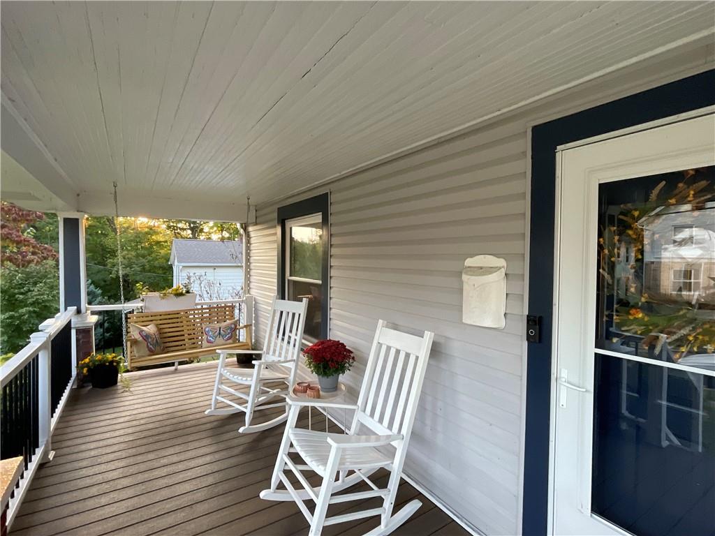 33 Line Street Sharpsville, PA 16150 - Photo 2 of 34 a balcony with chairs and wooden floor