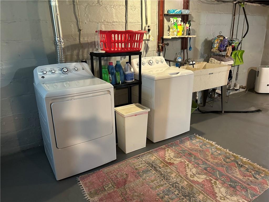33 Line Street Sharpsville, PA 16150 - Photo 23 of 34 a utility room with dryer and washer