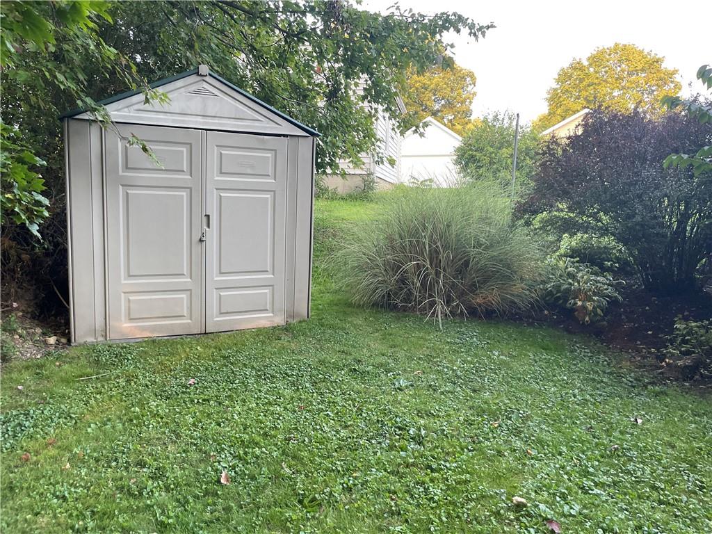 33 Line Street Sharpsville, PA 16150 - Photo 30 of 34 a front view of a house with garden