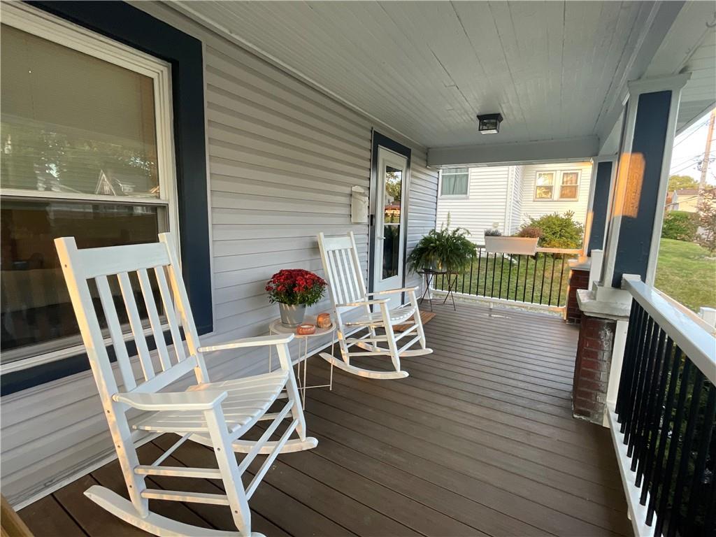 33 Line Street Sharpsville, PA 16150 - Photo 3 of 34 a view of a patio with a table chairs and wooden floor