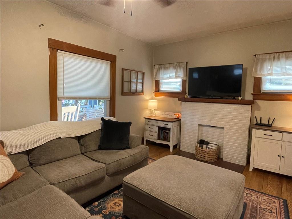 33 Line Street Sharpsville, PA 16150 - Photo 5 of 34 a living room with furniture and a flat screen tv