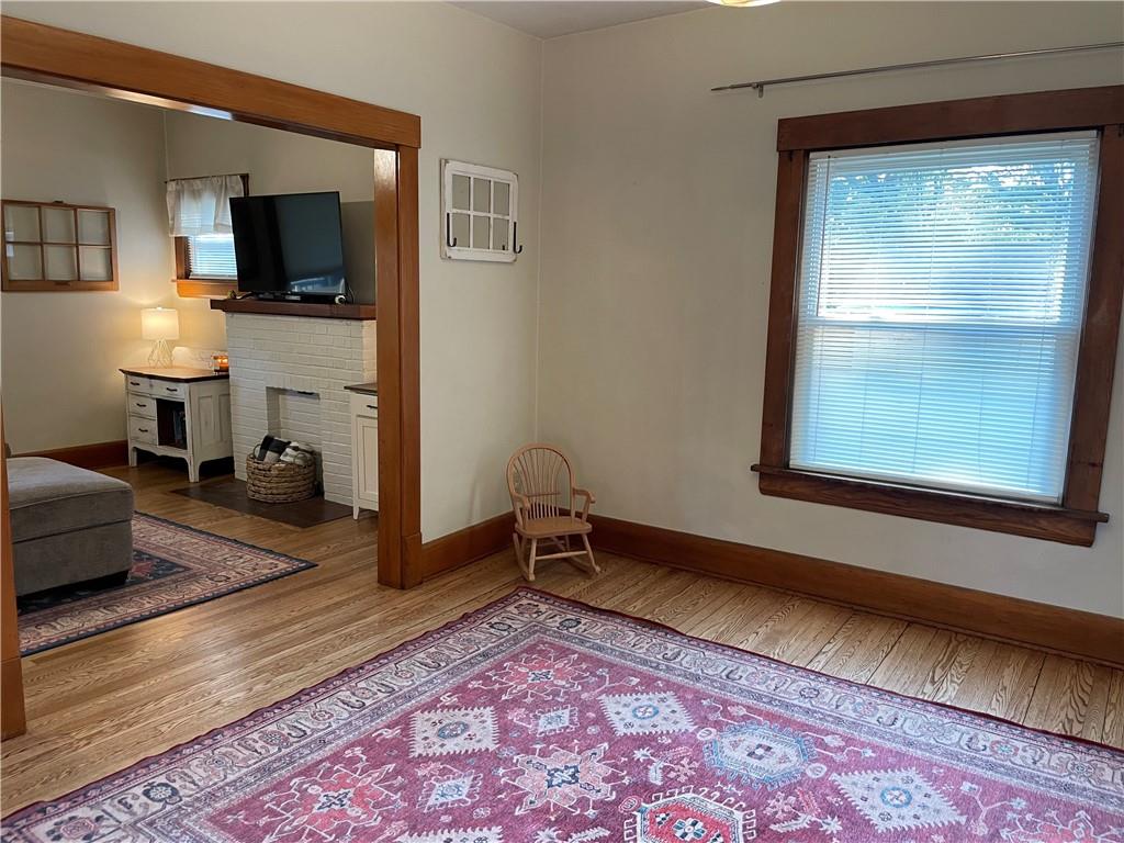 33 Line Street Sharpsville, PA 16150 - Photo 10 of 34 a living room with a couch and a flat screen tv