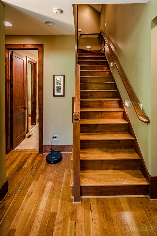 485 Woodlake Loop Road Elk Park, NC 28622 - Photo 22 of 44 a view of entryway and hall with wooden floor